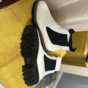 Dolce Vita Chelsea boots. Leather upper with black sole & white trim.